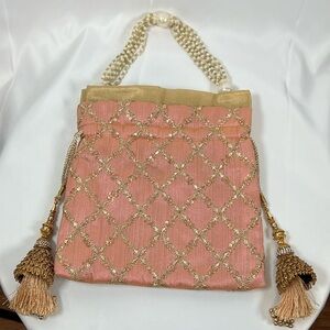 NWOT Embroidered linen drawstring purse with pearl strings handle.